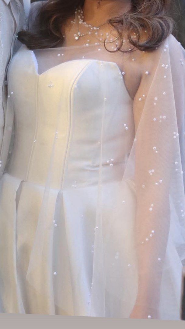 Off-Shoulder Satin Wedding Dress with Veil (Category: Announcements) located in Mandaluyong City. Submitted by mkaba (Listing ID 1454312110, Image 3). Description: - Beautiful off-shoulder wedding gown - Made of luxurious satin fabric - Features a full skirt and elegant train - Comes with a matching veil - Comfortable for dancing and celebrating - Designed to make you feel like a princess.