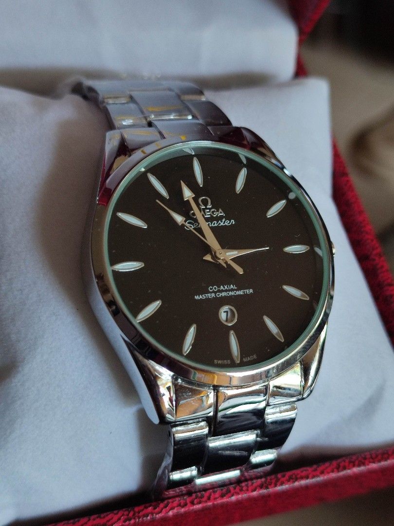 Omega Seamaster Co-Axial Master Chronometer Watch (Category: Luxury Watches) located in Mangaldan. Submitted by michelle_2004 (Listing ID 1454246248, Image 3). Description: - Omega Seamaster Co-Axial Master Chronometer - Features a sleek black dial with silver hands and hour markers - Durable stainless steel bracelet - Includes original Omega box - A truly great timepiece.