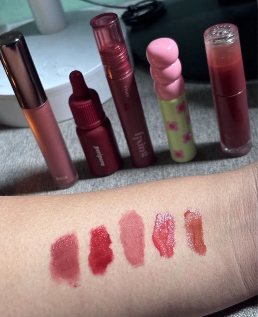 Peripera, Etude, Colorgram Lip Tints Bundle (Category: Makeup) located in Manila. Submitted by jazzaru (Listing ID 1454363575, Image 2). Description: 80 pesos each - will give discount if 3 or more Used max 3x-5x only - Etude Fixing Tint (06 Soft Walnut) - BBIA Velvet Tint (Feign Cool) - Peripera Ink Velvet (01) - Peripera Ink Moody (14) - Peripera Ink Moody (20 Brown Yakgwa) 50% remaining - Colorgram (2 Dewy Grapefruit) -Colorgram (5 Sweet Persi