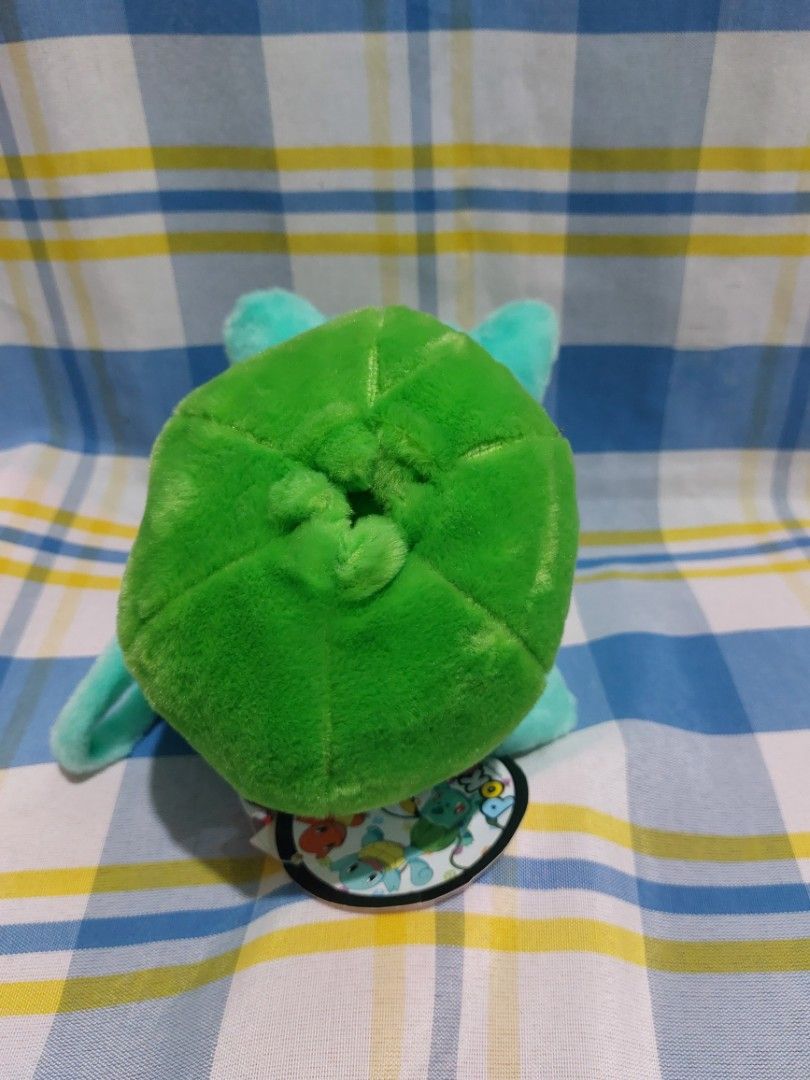 Pokemon Nintendo Bulbasaur Plush Toy Pouch (Category: Plushies & Soft Toys) located in Mandaluyong City. Submitted by 13thsilverrabbit (Listing ID 1454325542, Image 3). Description: Cute Bulbasaur plush toy. Has a zipper compartment on its back. Comes with a keychain loop. Great for Pokemon fans. Perfect to hang on bags or backpacks. Made with soft plush material. Officially licensed Pokemon merchandise..