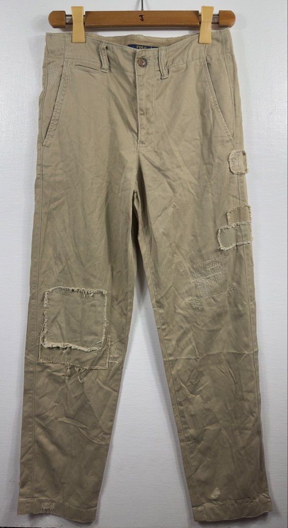Polo Ralph Lauren Khaki Distressed Patchwork Cargo Pants Size 0 (Category: Jeans) located in Manila. Submitted by collect__ph (Listing ID 1454218816, Image 1). Description: - Brand: Polo Ralph Lauren - Type: Khaki Cargo Pants - Size: 0 - Design: Unique distressed patchwork - Closure: Button and zip fly - Pockets: Two front, two back - Style: Great for a casual look - Dimes : 30” Waist x 19” Hip x 11” Rise x 7.5 “ leg opening x outseam 41” x insea