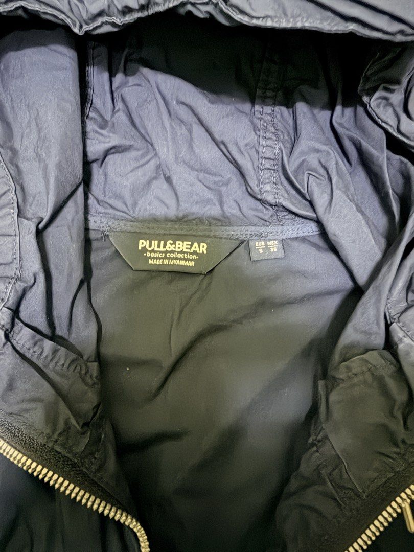 Pull & Bear Parka (Category: Coats, Jackets and Outerwear) located in Kuala Lumpur. Submitted by barangpakai (Listing ID 1454270549, Image 2). Description: - Navy blue hooded jacket from Pull & Bear - Basic collection, made in Myanmar - Full zip closure - Drawstring hood for adjustable coverage - Elasticated cuffs and hem for a snug fit - Ideal for layering or as a light outerwear - Easy to pack and carry - Pit 20 - Labuh 27-28 -DFOD.
