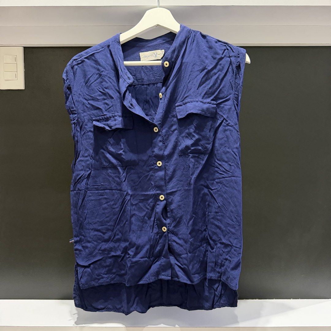 Regatta Navy Blue Sleeveless Button-Up Shirt (Category: Shirts) located in Pasig City. Submitted by flygirlfinds (Listing ID 1454293815, Image 1). Description: Please read full post before asking questions and making offers. Thank you! 😊 DETAILS Brand: Regatta Size: Medium Condition: 10/10 Used a few times, excellent condition RFS: Leaving the country, everything must go -——————————————————— LOWEST / LAST PRICE POSTED -———————————————————.