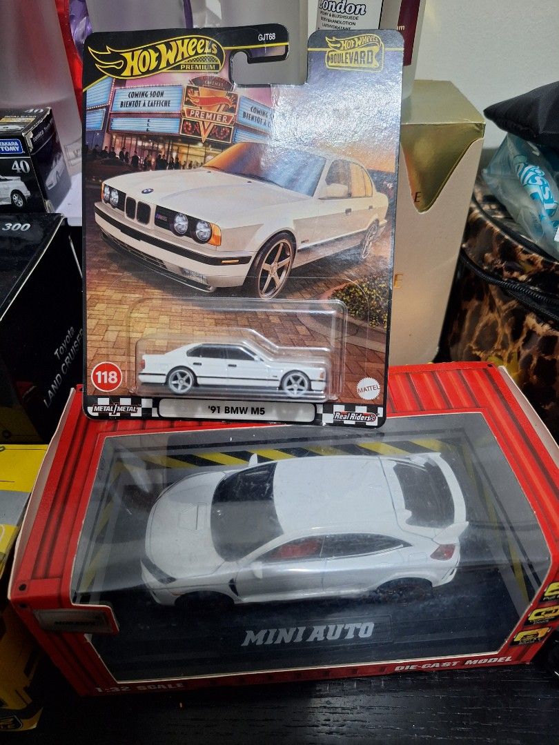Rush Selling: (Bundle) Random Die-Cast Collection (Tomica, Hot Wheels) (Category: Vehicle & Diecast Models) located in Makati City. Submitted by pengsuppp (Listing ID 1454308953, Image 2). Description: Selling as bundle. Or individually (500 each) Urgently need funds. - Tomica Lancer Evo 6 (SRP 600+) Open Box - Tomica Toyota MR2 w/ pop-up headlights (SRP 800+) Open Box - HW '91 BMW m5 - MX Die-castToyota LC300 1:32 scale (SRP 800+) - Power Die-Ca