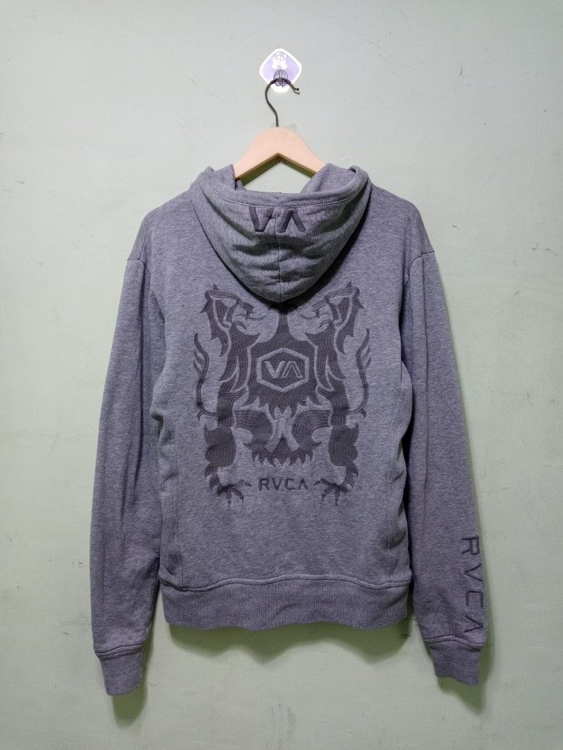 RVCA Grey Zip-Up Hoodie with Crest Logo (Category: Hoodies) located in Manila. Submitted by onewikstraight (Listing ID 1454259043, Image 1). Description: - Grey RVCA zip-up hoodie - RVCA crest logo on the front - Large RVCA graphic on the back - RVCA text detail on the sleeve - Two front pockets - Size small bestfit 20 21W 27L - Full zip closure - Adjustable drawstring hood PM 📨📥 1200+sf.