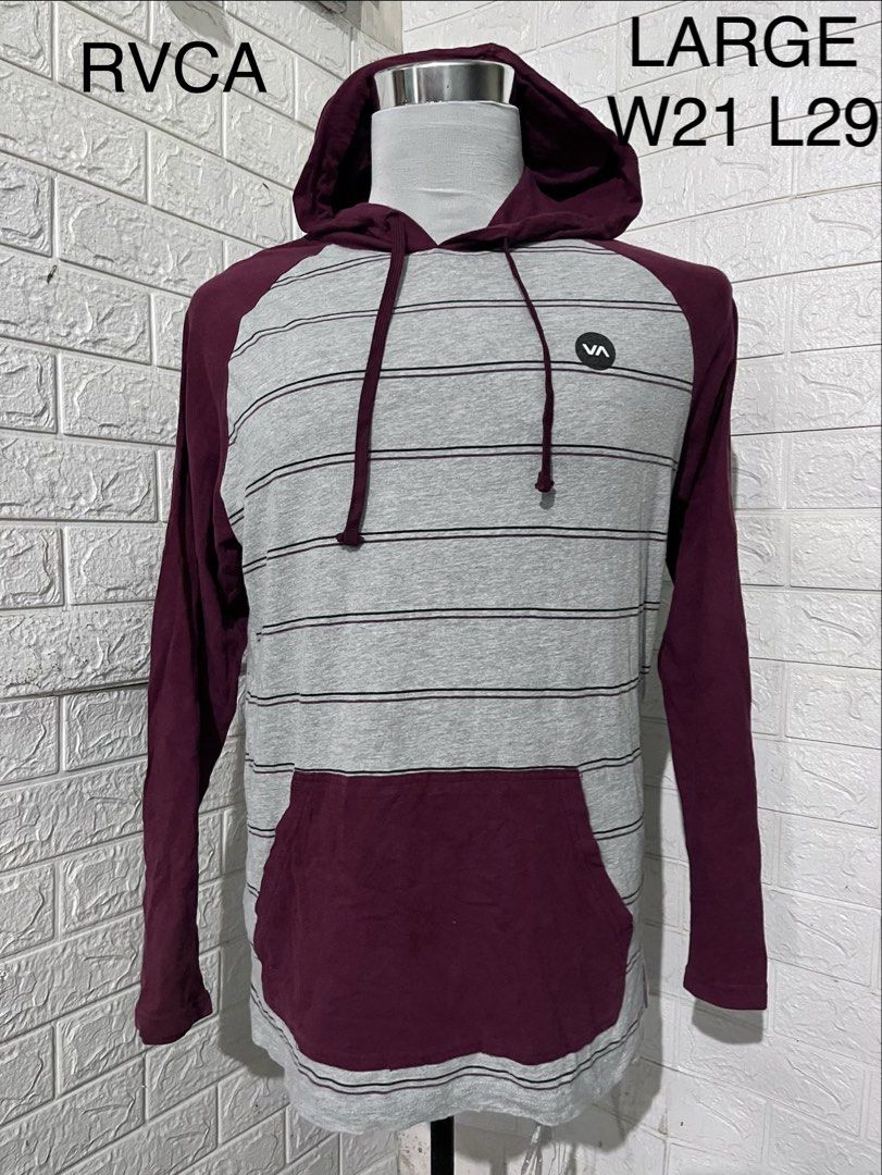RVCA Regular Fit Striped Hoodie - Large (Category: Hoodies) located in Kabankalan. Submitted by miaangelar73343 (Listing ID 1454320126, Image 1). Description: - RVCA Hoodie - Size: Large (L) - Fit: Regular - Color: Burgundy sleeves and hood, grey striped body - Features: Kangaroo pocket, small RVCA logo on chest - Material: 90% Cotton, 10% Polyester - Origin: Made in Guatemala.