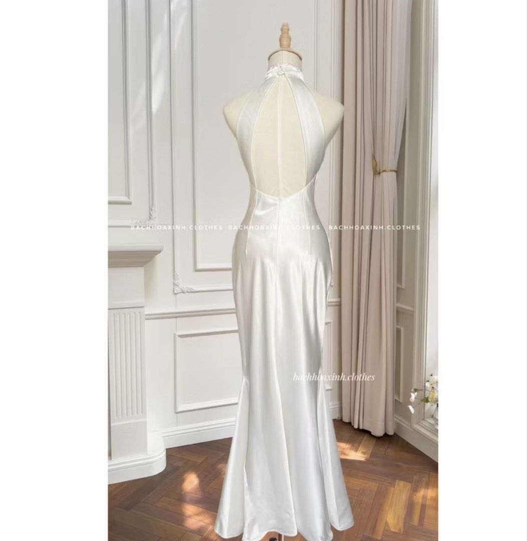 Satin Halter Neck Maxi Dress (Category: Dresses) located in Baguio. Submitted by deirdreyy (Listing ID 1454244858, Image 3). Description: - Long satin dress - Halter neck design - Open back - Fishtail hemline - Color: Champagne/Gold - Ideal for formal events, parties, and special occasions - used once.