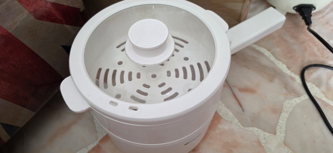 Simplus Electic Cooker (Category: Cookers) located in Singapore. Submitted by jesjes. (Listing ID 1454246876, Image 1). Description: Simplus Kit Electric Cooker 1.8L Without power cord.