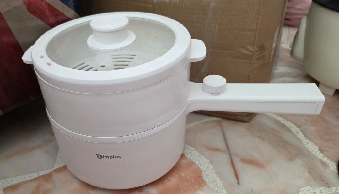 Simplus Electic Cooker (Category: Cookers) located in Singapore. Submitted by jesjes. (Listing ID 1454246876, Image 2). Description: Simplus Kit Electric Cooker 1.8L Without power cord.
