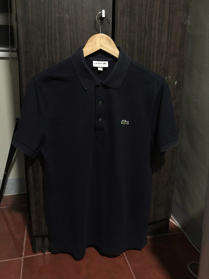 Size 5 Slim Fit Lacoste Polo (navy) (Category: Tshirts & Polo Shirts ) located in Bulacan. Submitted by dailybumps (Listing ID 1454299968, Image 2). Description: 21x28 Authentic No flaw complete with spare button.