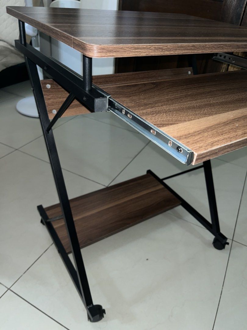 Study Table - Mandaue Foam AJA Student Desk (Category: Tables & Sets) located in Cainta. Submitted by monicanbuyhappiness (Listing ID 1454299671, Image 2). Description: RFS: Extra Desk, supposed to be for someone but they no longer needed it. - Already Built - Has 4 wheels, underdesk for extra table space, and is perfect for home offices, dorms, etc.. SF is shouldered by the buyer. Mandaue Foam BRAND NEW Aja Study Desk.