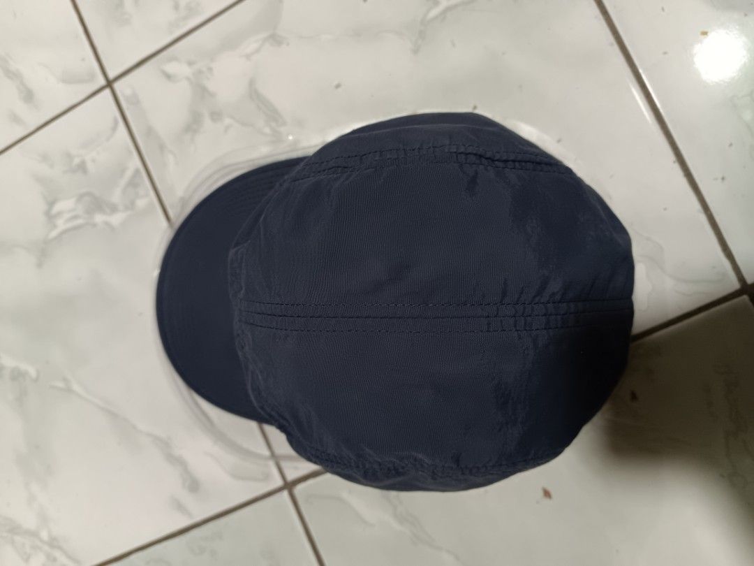 The North Face Navy Blue Cap (Category: Caps & Hats) located in Manila. Submitted by caaths_collection (Listing ID 1454359482, Image 3). Description: - Brand: The North Face - Color: Navy Blue - Material: Polyester - Features: Embroidered logo on front and back, adjustable strap - Ideal for: Outdoor activities and casual wear - Original .
