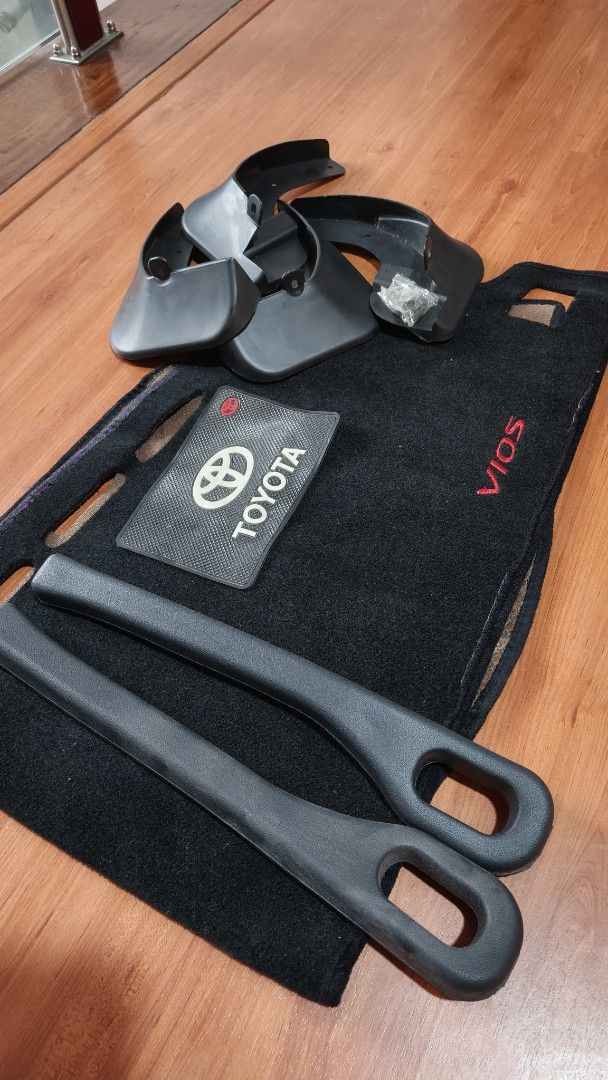 Toyota Vios Mudguards, Floor Mat & Interior Trim (Category: Other Automotive Parts and Accessories) located in Manila. Submitted by allenpaul26 (Listing ID 1454196890, Image 1). Description: - Complete black accessory set for Toyota Vios for 2019 model - Includes: Mudguards, not use (black with red 'VIOS' embroidery), 2 Interior Trim Pieces, Toyota Branded Dashboard Mat - Enhances interior aesthetics and provides exterior protection - All items a