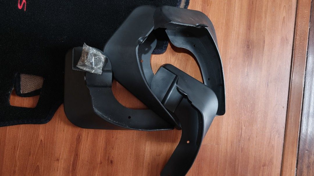 Toyota Vios Mudguards, Floor Mat & Interior Trim (Category: Other Automotive Parts and Accessories) located in Manila. Submitted by allenpaul26 (Listing ID 1454196890, Image 3). Description: - Complete black accessory set for Toyota Vios for 2019 model - Includes: Mudguards, not use (black with red 'VIOS' embroidery), 2 Interior Trim Pieces, Toyota Branded Dashboard Mat - Enhances interior aesthetics and provides exterior protection - All items a