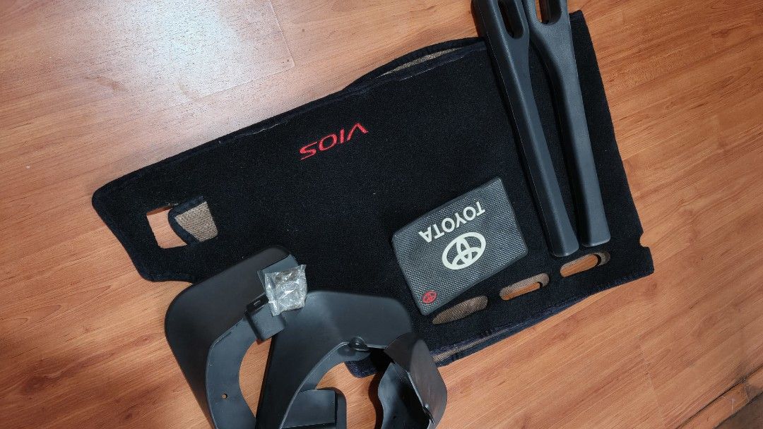 Toyota Vios Mudguards, Floor Mat & Interior Trim (Category: Other Automotive Parts and Accessories) located in Manila. Submitted by allenpaul26 (Listing ID 1454196890, Image 2). Description: - Complete black accessory set for Toyota Vios for 2019 model - Includes: Mudguards, not use (black with red 'VIOS' embroidery), 2 Interior Trim Pieces, Toyota Branded Dashboard Mat - Enhances interior aesthetics and provides exterior protection - All items a