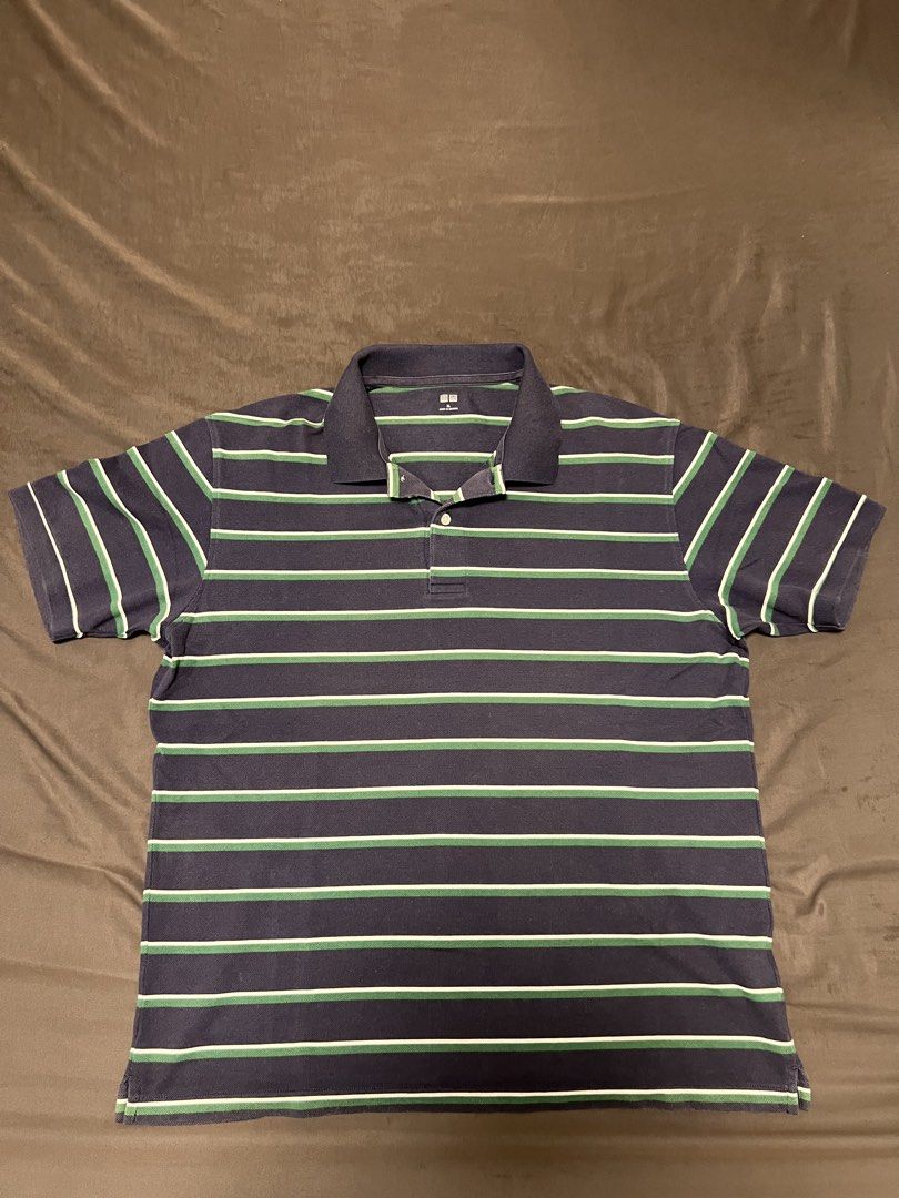 Uniqlo polo shirt (Category: Tshirts & Polo Shirts ) located in Mandaluyong City. Submitted by minimalmeowguy (Listing ID 1454198426, Image 1). Description: Uniqlo polo shirt - cotton fabric - 9.5/10 condition. Used but not abused - dimes are in the photos - not my style anymore.