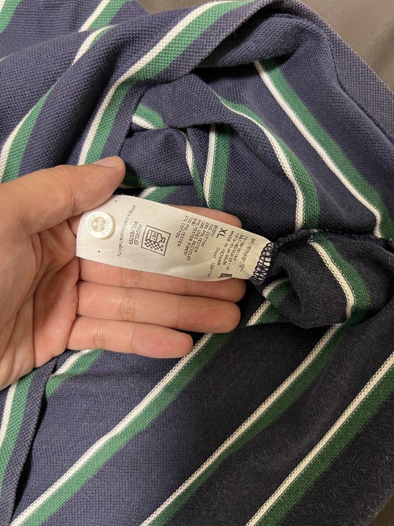 Uniqlo polo shirt (Category: Tshirts & Polo Shirts ) located in Mandaluyong City. Submitted by minimalmeowguy (Listing ID 1454198426, Image 3). Description: Uniqlo polo shirt - cotton fabric - 9.5/10 condition. Used but not abused - dimes are in the photos - not my style anymore.