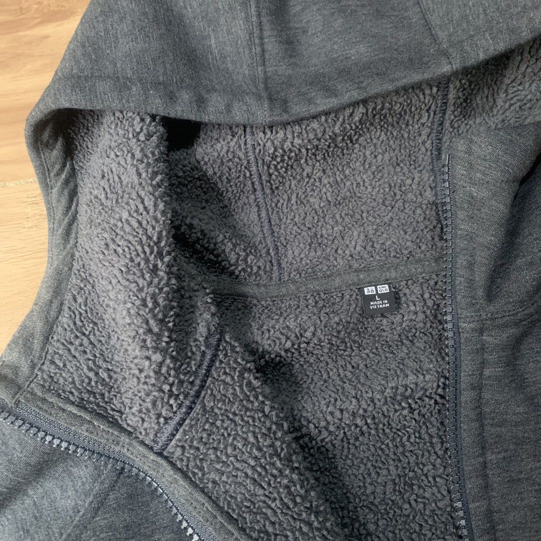 Uniqlo Zip-Up Poly Hoodie (Category: Activewear) located in Manila. Submitted by curated_pieces.ph (Listing ID 1454280329, Image 3). Description: Size: M-L Dimensions: 22”W 26”L Condition: Excellent (no flaws) Color rate: 9.7/10.