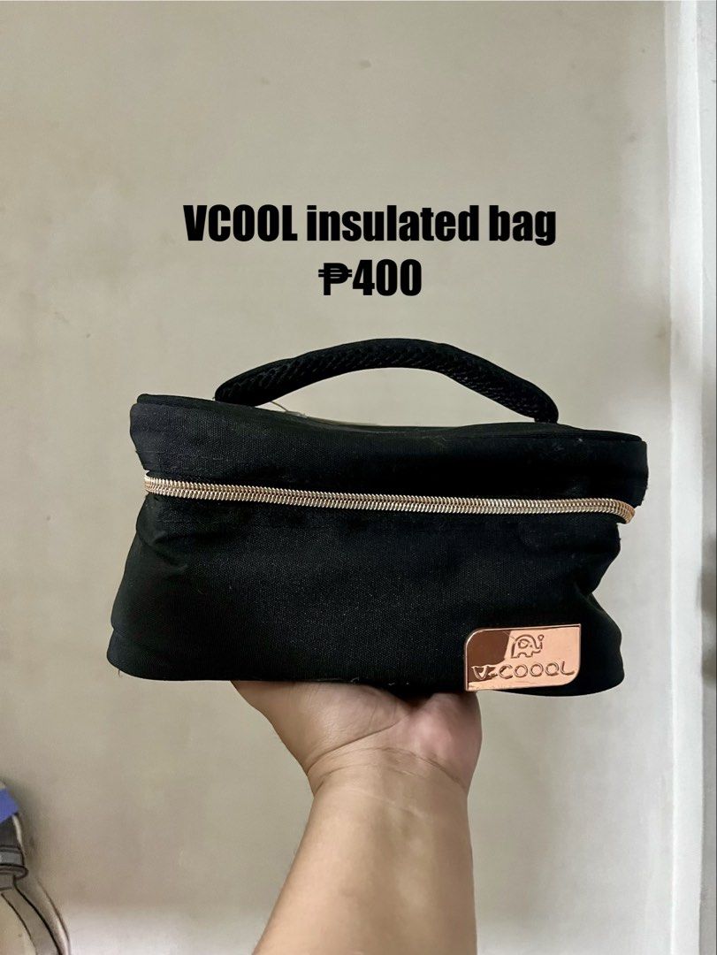 VCOOL Insulated Bag (Category: Breastfeeding & Bottle Feeding) located in Manila. Submitted by jmrevilla30 (Listing ID 1454295967, Image 1). Description: - Black VCOOL insulated bag - Features elegant rose gold zipper and logo detail - Excellent for maintaining food and drink temperature (hot or cold) - Compact design with a convenient carrying handle - Perfect for on-the-go lunches and snacks.