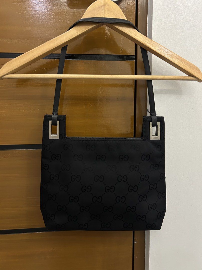 Vintage Black Gucci Shoulder Handbag (Category: Luxury Bags & Wallets) located in Manila. Submitted by lharadrian67 (Listing ID 1454193054, Image 2). Description: Vintage Black Gucci Shoulder Handbag GOOD CONDITION ISSUE CHECK THE PICTURES NEGOTIABLE .