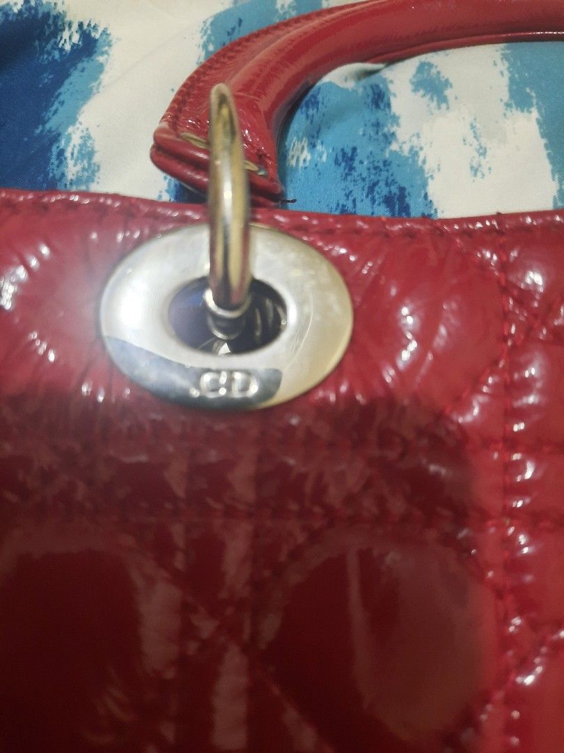 !REPRICED!Vintage Lady Dior (Category: Luxury Bags & Wallets) located in Amadeo. Submitted by thebagreserve (Listing ID 1454195993, Image 2). Description: Vintage Dior Lady Dior Cannage Quilted Patent Leather Handbag – Cherry Red ( From P4500 to P3500) * With code * Please self authenticate ! No Return No Exchange ! ​Elevate your wardrobe with this iconic Lady Dior handbag crafted in glossy cherry red patent leather featuring Christian Dior's sig