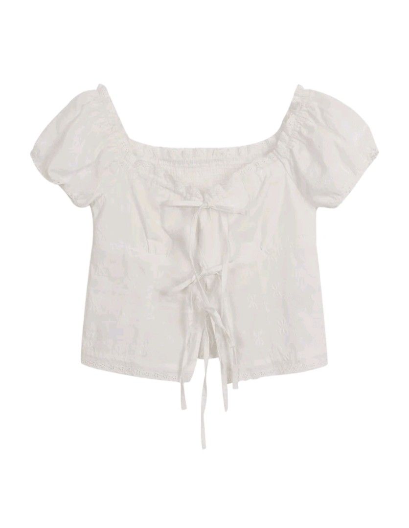 White Off-Shoulder Puff Sleeve Tie-Front Crop Top (Category: Blouses) located in Manila. Submitted by yuna.com (Listing ID 1454314190, Image 2). Description: rfs. too small for me. worn once product measurements: (small) Bust: 69 cm, Length: 28 cm location: Pasay City.