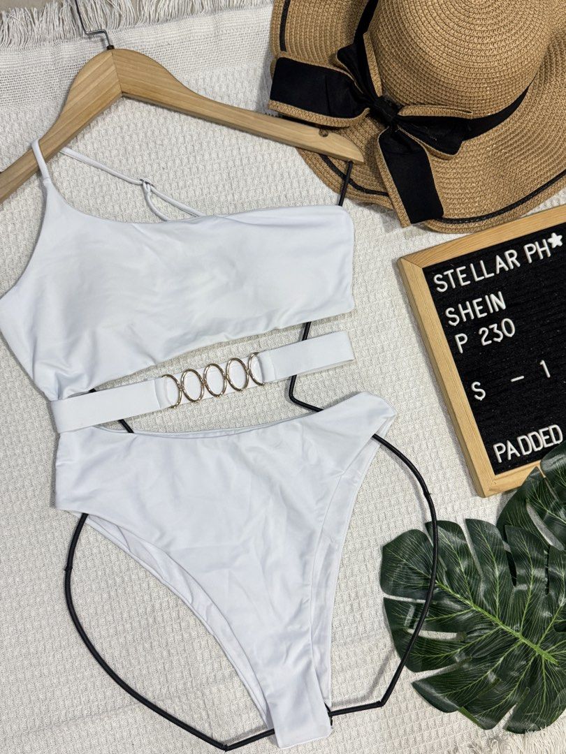 White One-Shoulder Bikini Set with Gold Ring Detail (Category: Bikinis & Swimsuits) located in Manila. Submitted by camillestc (Listing ID 1454318221, Image 1). Description: - Stylish white one-shoulder bikini top - High-waisted bikini bottoms - Matching belt with chic gold ring details - Padded cups for added comfort and shape - Best fit: SMALL TO MEDIUM - Super chic and fashionable design.