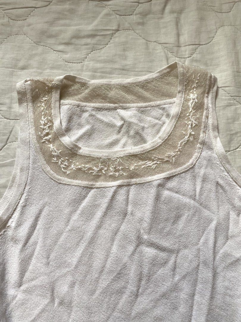 White Tank Top with Lace Neckline (Category: Sleeveless) located in Quezon City. Submitted by viacb (Listing ID 1454253838, Image 2). Description: mop: gcash mod: jnt/lalamove *location: quezon city.