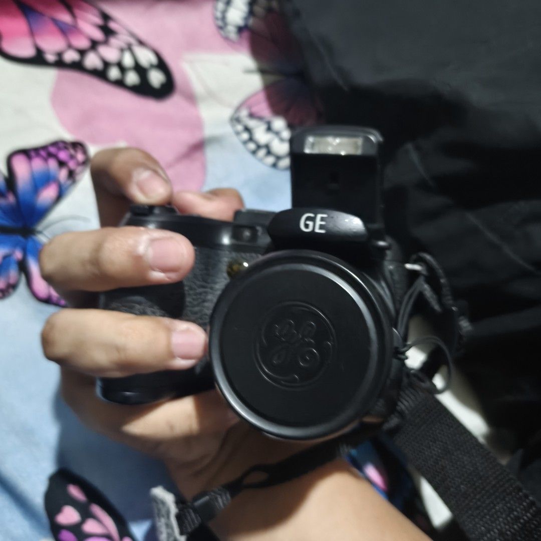 [WORKING] GE X5 Bridge Camera (Category: Cameras) located in Ilagan. Submitted by bajustine (Listing ID 1454289909, Image 1). Description: ‎[WORKING] GE X5 Bridge Camera ‎🏷️₱2,700+ shipping fee‼️ ‎ ‎SAMPLE SHOTS 📸: ‎ https://drive.google.com/drive/folders/19dMo0OUqw2ZkydFhZ8CaQDBlyDAuBhCX ‎+ Little to NO scratches ‎+ With red light ‎+ All switches working ‎+ All buttons working ‎+ Zoom works ‎+ Flash works ‎+ With lens cap and original strap + 