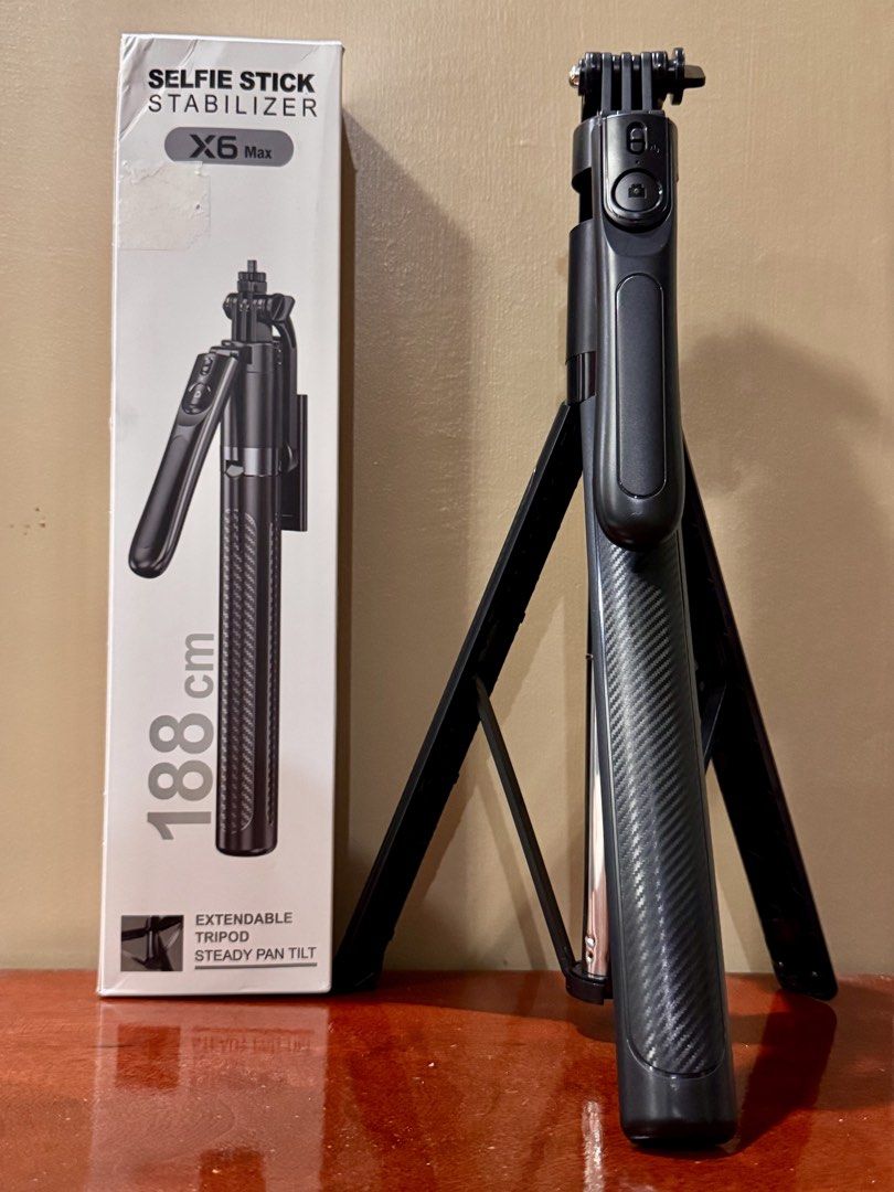 X6 Max Selfie Stick Stabilizer Extendable Tripod (Category: Tripods & Monopods) located in Tayug. Submitted by pearly2124 (Listing ID 1454253339, Image 1). Description: - X6 Max Selfie Stick Stabilizer - Extends up to 188cm - Built-in extendable tripod base for steady shots - Pan and tilt functionality included - Perfect for vlogging, stable photos, and videos.