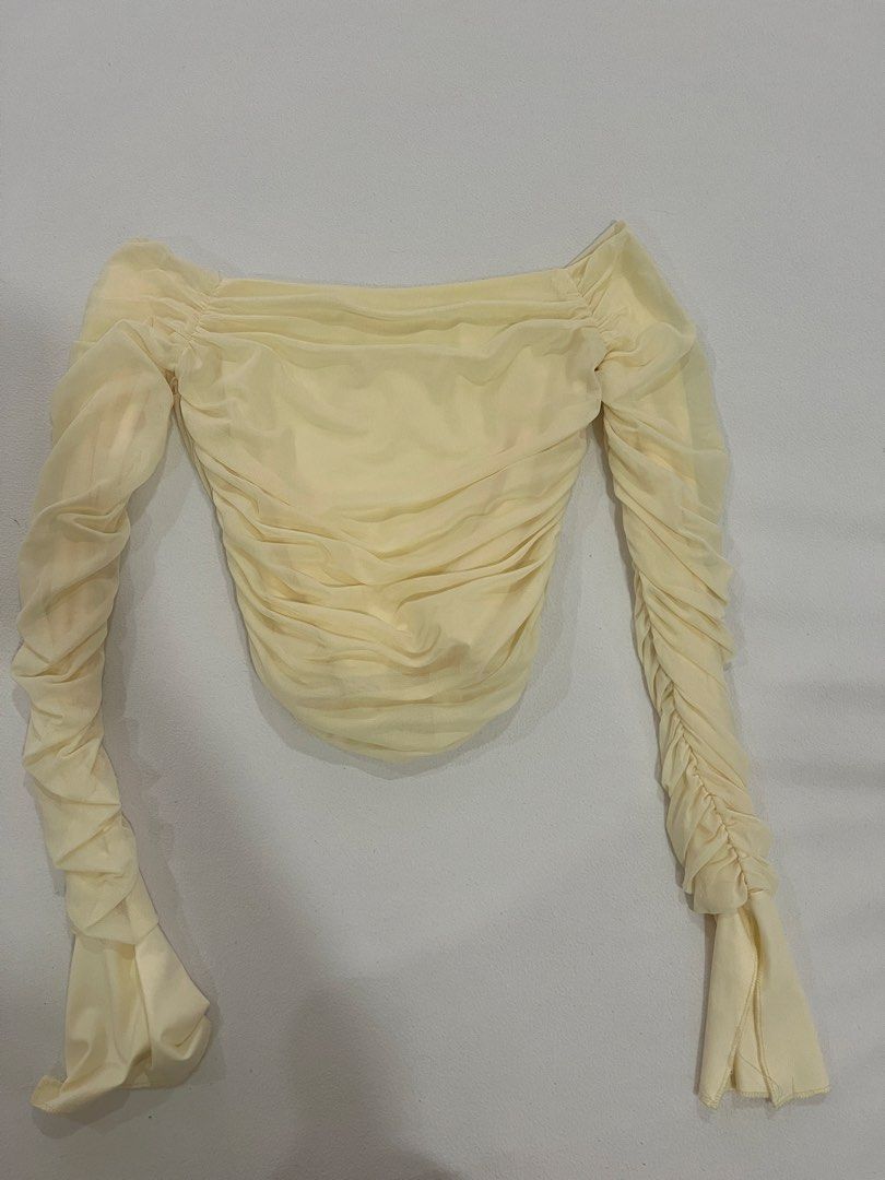 Yellow Ruched Off-Shoulder Conquette Long Sleeve Top (Category: Longsleeves) located in Batangas. Submitted by bnpm42 (Listing ID 1454256721, Image 3). Description: - very pretty and dainty! 😍 - just washed, never worn outside - size m but can fit xs-m since its stretchy - get niyo naaa super ganda and good quality! 💛.