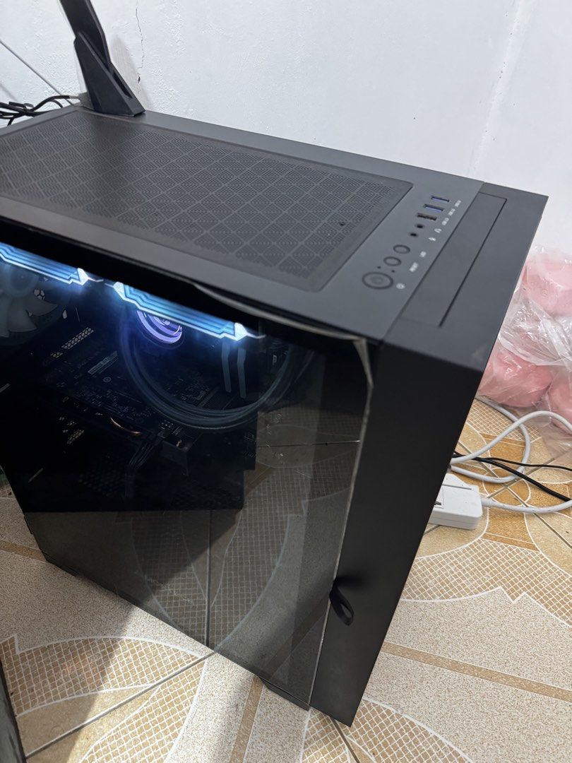 2nd Hand PC (Category: Desktops) located in Manila. Submitted by richhvict (Listing ID 1454535929, Image 3). Description: 🖥️ GAMING PC FOR SALE — ₱38,000 🎮✨ i5-12400 + RX 6500 XT | 16GB RAM | 1TB+ Storage | AIO Cooling Selling this secondhand gaming PC, purchased in July 2024. 🖤 Clean black aesthetic, tempered glass side panel, RGB lighting, and AIO liquid cooling — perfect if you want a gaming PC na powerful enough for everyday gaming/work bu
