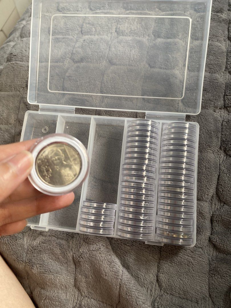 45 pcs coin plastic storage with box (Category: Storage Boxes & Baskets) located in Taguig. Submitted by ceej0915 (Listing ID 1454448999, Image 1). Description: 🪙 45-Pcs Round Coin Storage Box * Includes 45 pcs round coin holders * Comes with a 5-slot storage box * Coin shown in the photo is for display only and NOT included * Some coin holders are missing, as shown in the photos * Great for organizing and protecting collectible coins * Pre-love