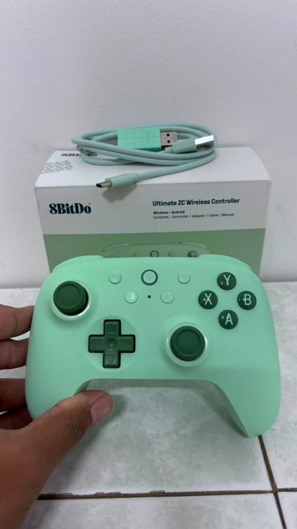 8BitDo Ultimate 2C Wireless Controller (Category: Controllers) located in Kuala Lumpur. Submitted by wildtree.960cbf (Listing ID 1454463764, Image 1). Description: - 1 x 2.4G Wireless Receiver - 1 x USB-C Cable - 1 x Instruction Manual *Features:* - *1000Hz Polling Rate:* Achieve ultra-responsive gameplay with low-latency performance, ensuring you never miss a move. - *Hall Effect Joysticks & Triggers:* Built for precision and durability, these c