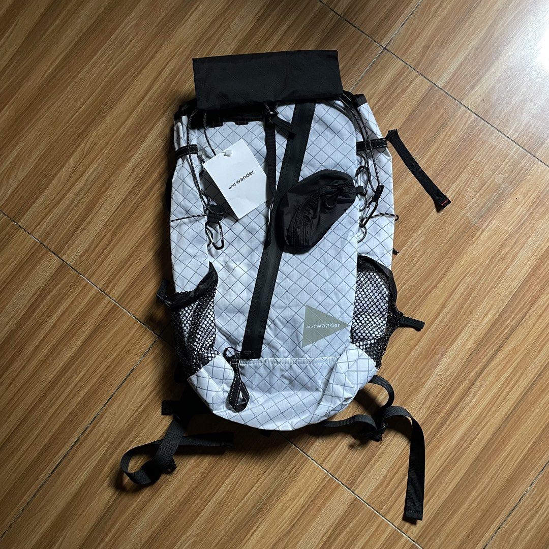 And Wander ECOPAK 30L Backpack (Category: Backpacks) located in General Mariano Alvarez. Submitted by 4117_thriftnthrive (Listing ID 1454445662, Image 2). Description: As new condition No flaws The and wander ECOPAK 30L Backpack is shown here in white, constructed from water-resistant, recycled polyester with a distinct diamond grid pattern. ₱6,000 each ( Plus Shipping Fee ).