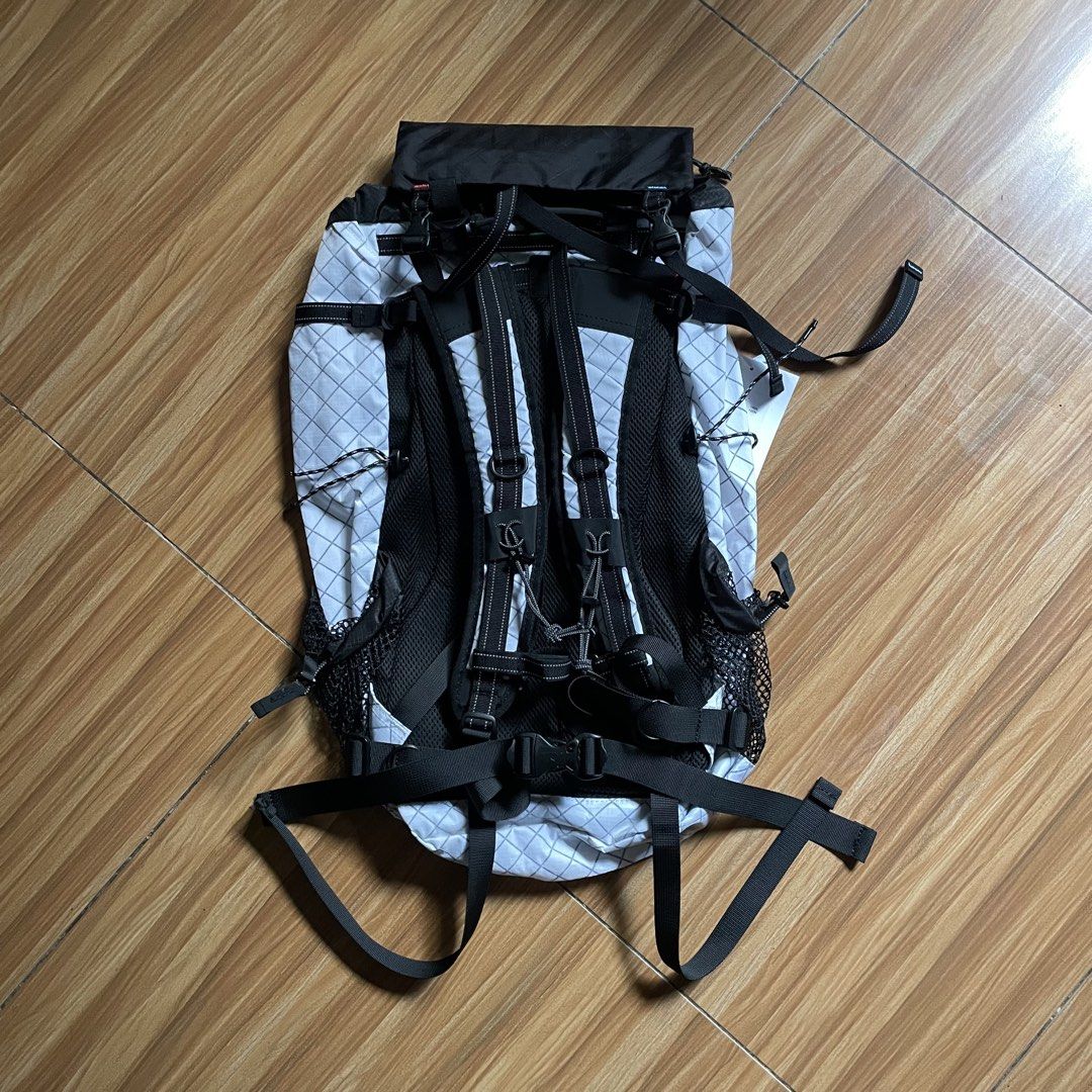 And Wander ECOPAK 30L Backpack (Category: Backpacks) located in General Mariano Alvarez. Submitted by 4117_thriftnthrive (Listing ID 1454445662, Image 3). Description: As new condition No flaws The and wander ECOPAK 30L Backpack is shown here in white, constructed from water-resistant, recycled polyester with a distinct diamond grid pattern. ₱6,000 each ( Plus Shipping Fee ).