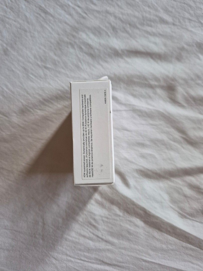 Apple 40W Dynamic Power Adapter USB-C (Category: Chargers & Cables) located in Quezon City. Submitted by ateeglobal (Listing ID 1454389644, Image 3). Description: - Original Apple 40W USB-C Power Adapter - Dynamically provides up to 40W of power - Ideal for hardware and software requiring consistent 40W with 60W Max - Includes original box - Price is firm.
