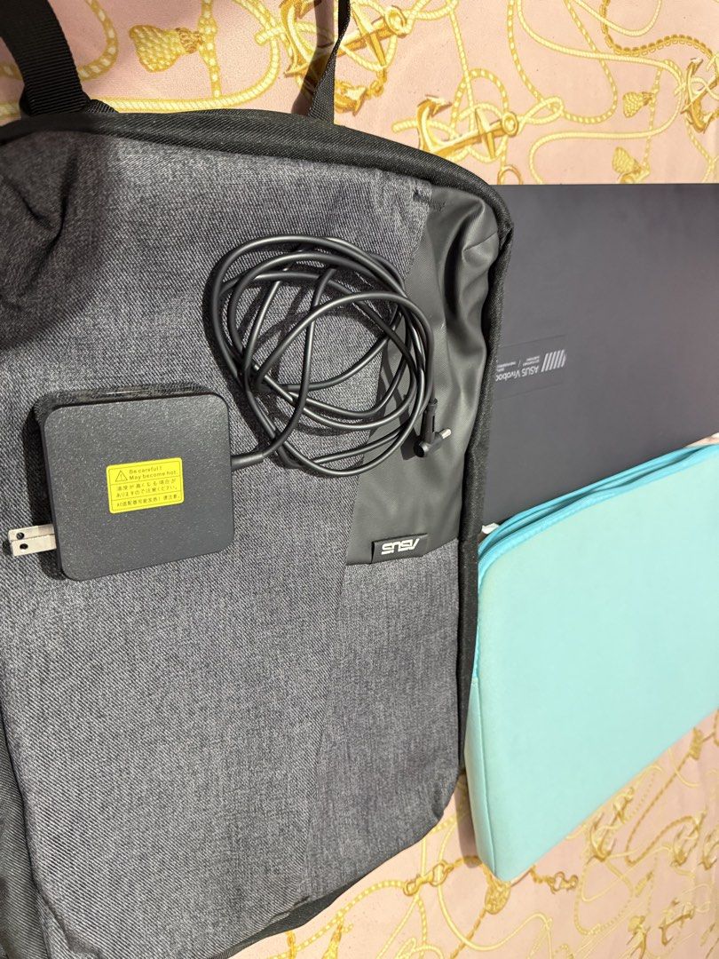 Asus Vivo book 15 OLED (Category: Laptop Bags & Sleeves) located in Caloocan City. Submitted by swiftcloud_7d0725 (Listing ID 1454378812, Image 1). Description: Alightly used, comes with laptop bag,pouch and box and charger..