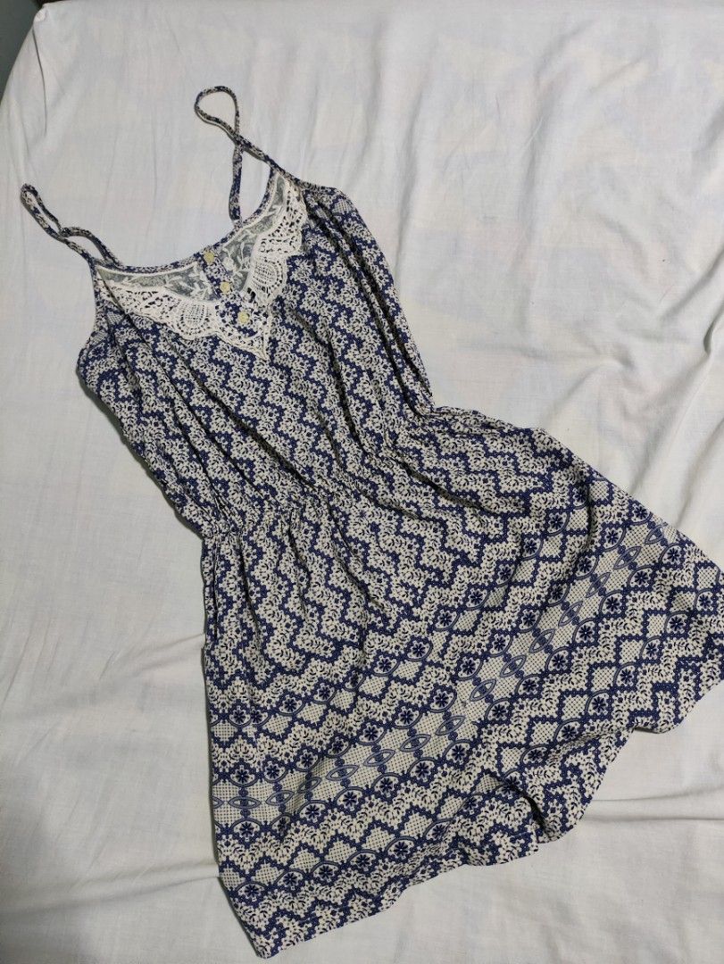 Atmosphere Blue & White Patterned Romper with Lace Detail (Category: Rompers) located in Lucena. Submitted by cha_riz010726 (Listing ID 1454444868, Image 1). Description: - Adorable blue and white patterned romper - Features delicate spaghetti straps - Pretty lace detail at the neckline - Elasticated waist for a comfortable, adjustable fit - Ideal for casual outings, beach days, or lounging - Effortlessly stylish and easy to wear.