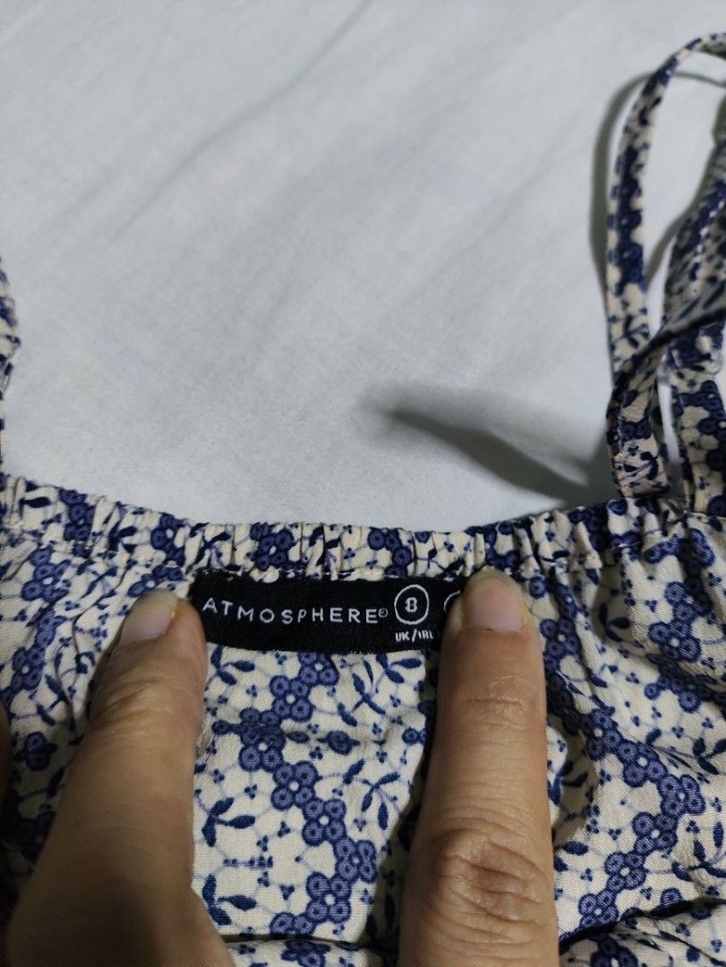 Atmosphere Blue & White Patterned Romper with Lace Detail (Category: Rompers) located in Lucena. Submitted by cha_riz010726 (Listing ID 1454444868, Image 2). Description: - Adorable blue and white patterned romper - Features delicate spaghetti straps - Pretty lace detail at the neckline - Elasticated waist for a comfortable, adjustable fit - Ideal for casual outings, beach days, or lounging - Effortlessly stylish and easy to wear.