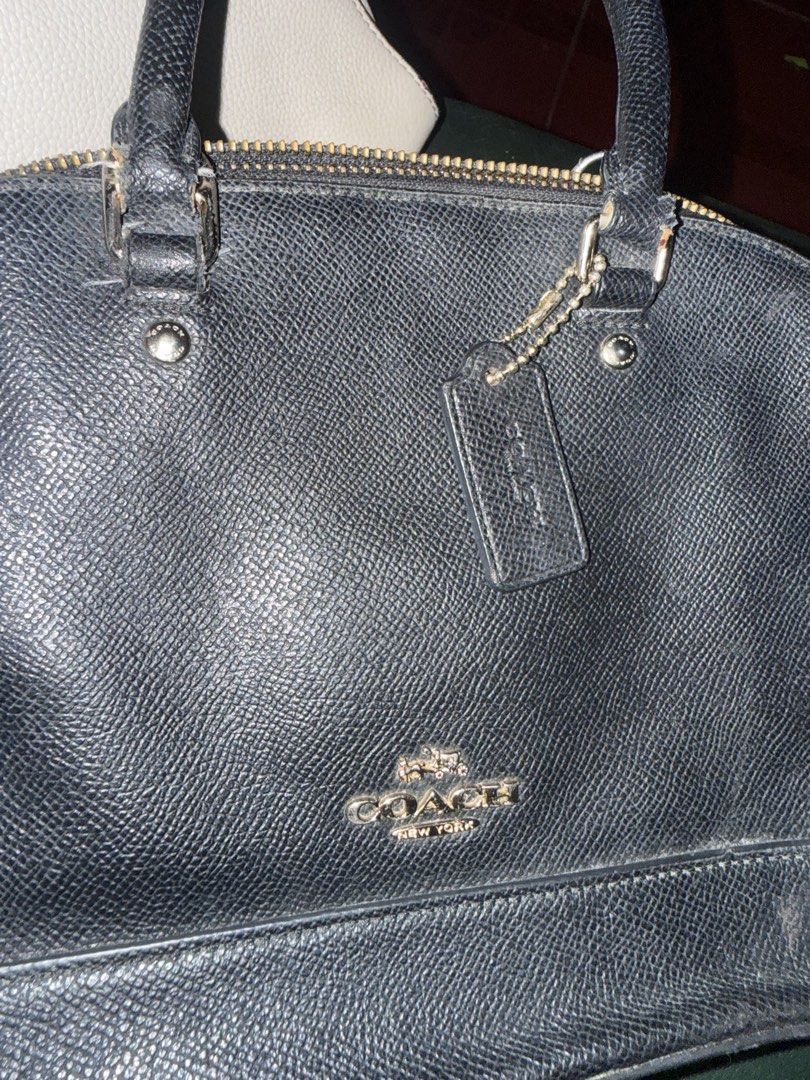 Authentic Coach Black Dome Bag (Category: Luxury Bags & Wallets) located in Manila. Submitted by handpickedbyannecox (Listing ID 1454394178, Image 3). Description: - Authentic black Coach satchel bag - Crafted from premium pebbled leather - Secure zip-top closure for your essentials - Convenient interior pockets for organization - Elegant embossed Coach logo on the front - Signs of used sa handle strap ❌No sling❌ ❌Bawal sa maarte ❌ ❌No COD❌.