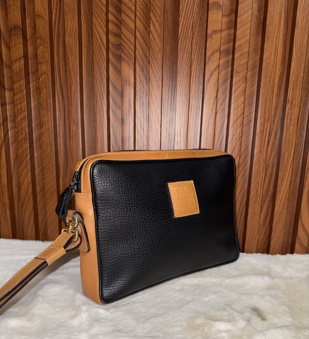 Authentic Givenchy Clutch abag (Category: Everything Else Others) located in Subic. Submitted by luxshoppe88 (Listing ID 1454465649, Image 3). Description: Authentic givenchy clutch bag. Givenchy paris. Made in Italy. Full top zip closure. Leather material. In excellent condition. Very nice actual. mode of payment : bpi and gcash shipping will be done once payment confirm.. or the next day. HAPPY SHOPPING!! T-H-A-N-K Y-O-U! 😊 .