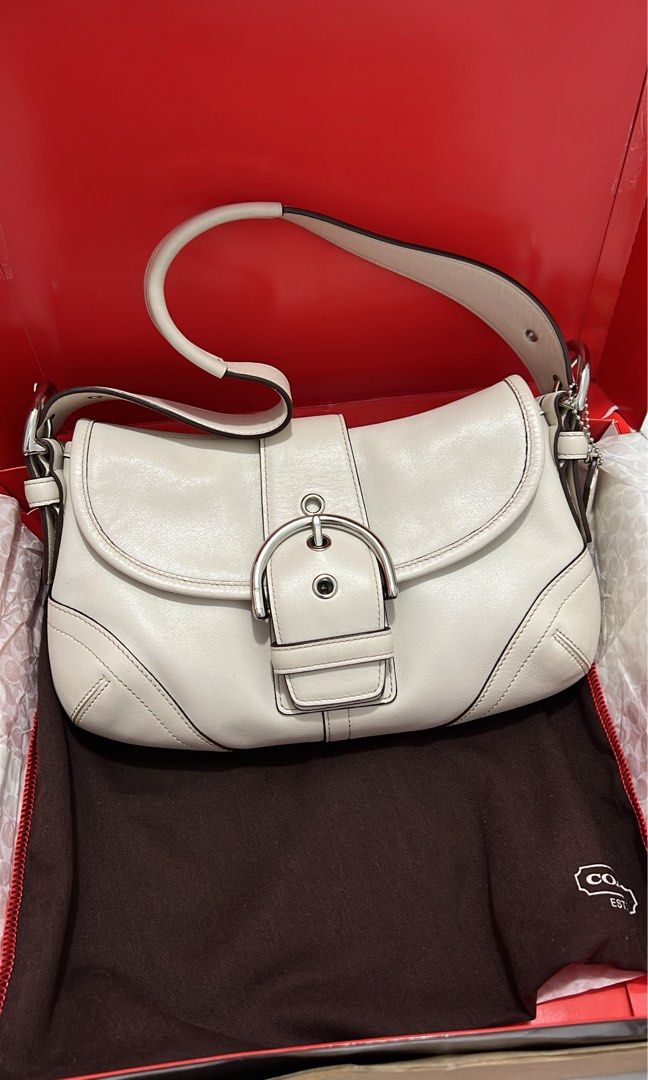 Authentic Rare Vintage Coach Mini Soho in Offwhite (Category: Shoulder Bags) located in Manila. Submitted by maviii21 (Listing ID 1454541020, Image 2). Description: Authentic Rare Vintage Coach Mini Soho in Offwhite Rank SA ✨ Excellent condition No issue With hangtag Complete inclusion: box, dustbag, card, and tissue wrap Slightly nego 🙏 Free Sf!! With free charms (if may available pa!) super super gandang bag and vv hard to source, kaso it’s no