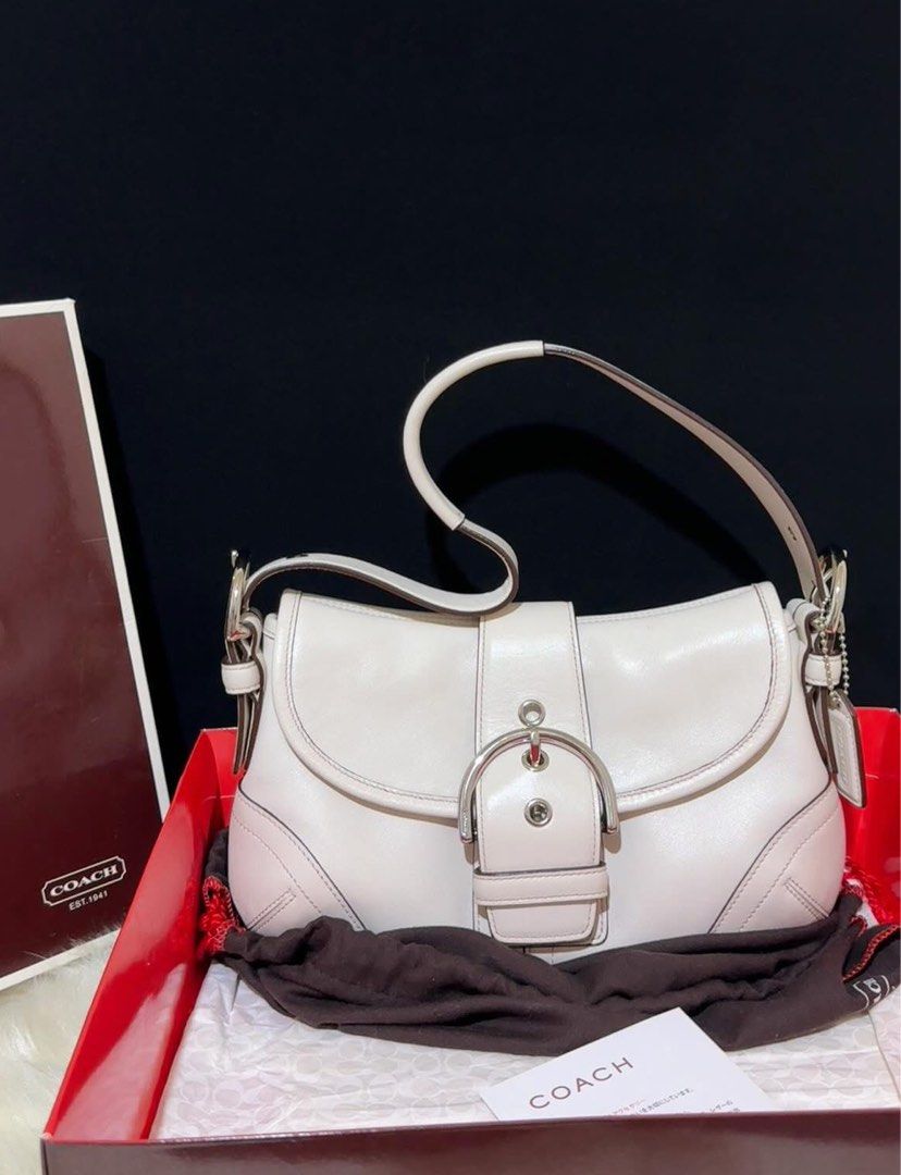 Authentic Rare Vintage Coach Mini Soho in Offwhite (Category: Shoulder Bags) located in Manila. Submitted by maviii21 (Listing ID 1454541020, Image 1). Description: Authentic Rare Vintage Coach Mini Soho in Offwhite Rank SA ✨ Excellent condition No issue With hangtag Complete inclusion: box, dustbag, card, and tissue wrap Slightly nego 🙏 Free Sf!! With free charms (if may available pa!) super super gandang bag and vv hard to source, kaso it’s no