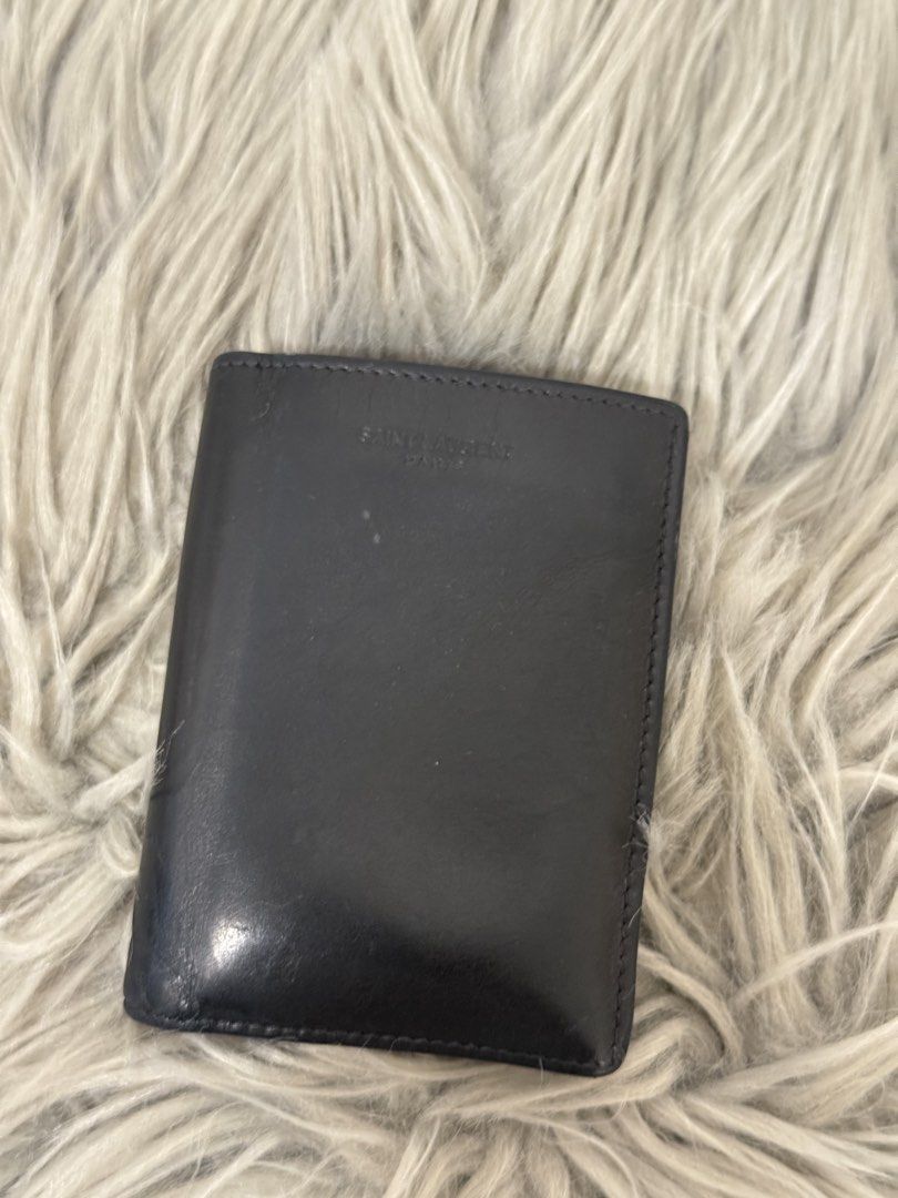 Authentic YSL Bifold Wallet (Category: Luxury Bags & Wallets) located in Paoay. Submitted by ysmattic (Listing ID 1454513920, Image 1). Description: 100% guaranteed authentic YSL bifold wallet. Seven cardslots, bill compartement..