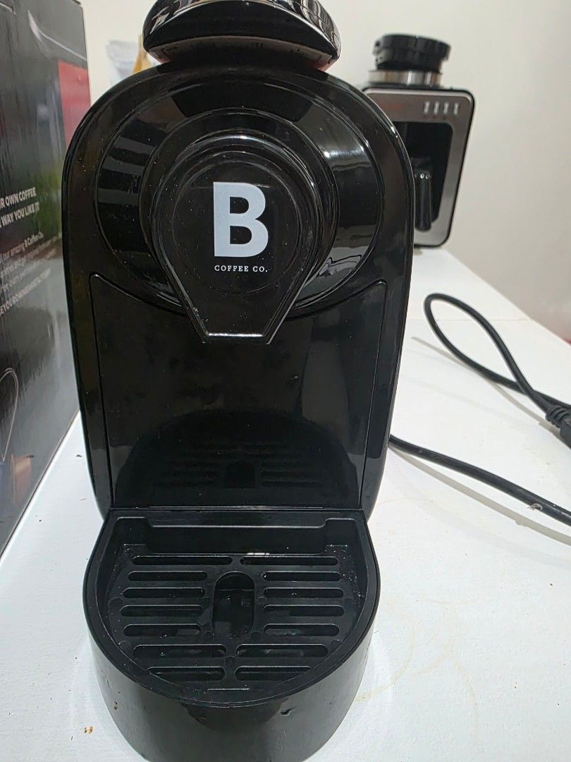 B Coffee Co. The Freshman Capsule Espresso Machine (Category: Coffee Machines & Makers) located in Mandaluyong City. Submitted by lacastell00 (Listing ID 1454481578, Image 3). Description: - B Coffee Co. The Freshman capsule espresso machine - Color: Red and Black - Create your own coffee shop experience at home - Easy to use - Includes original box - Ideal for coffee enthusiasts - Nespresso compatible - Location: Makati / Mandaluyong.