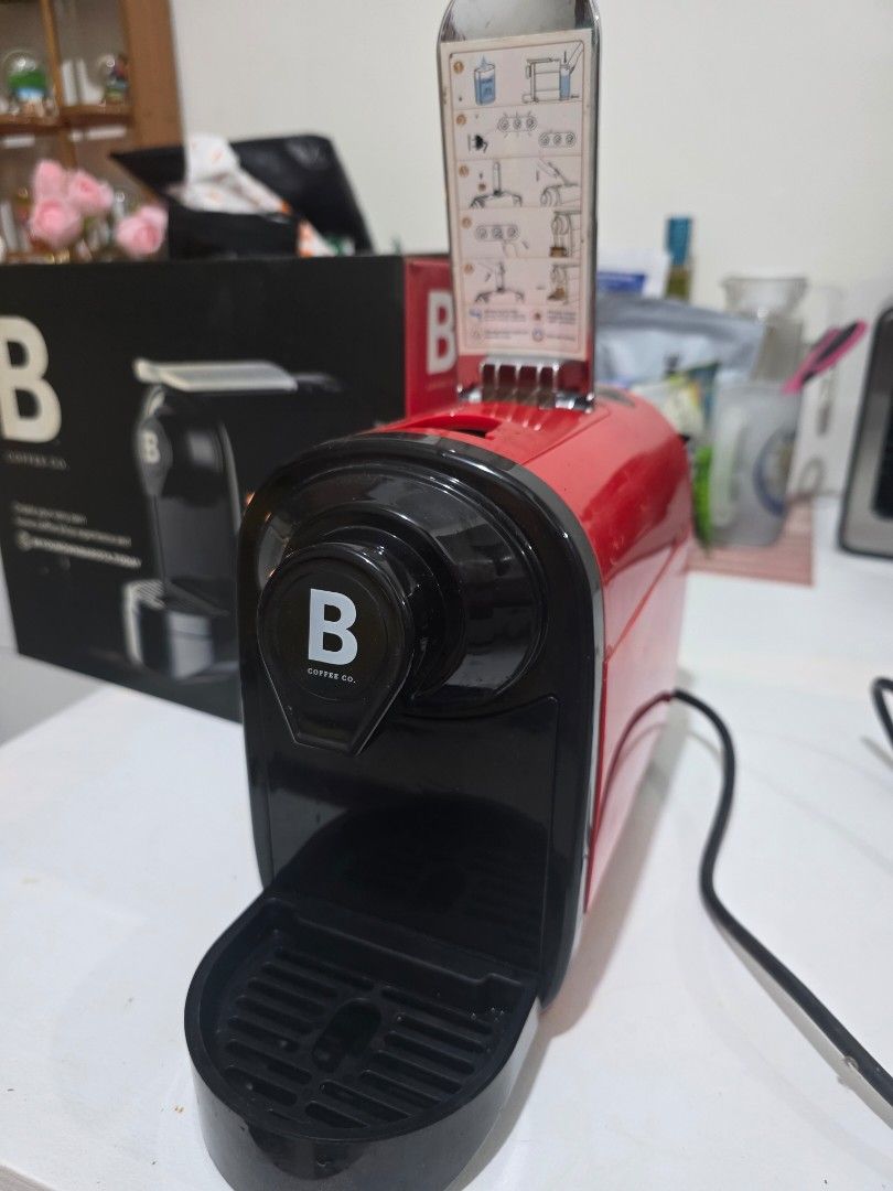 B Coffee Co. The Freshman Capsule Espresso Machine (Category: Coffee Machines & Makers) located in Mandaluyong City. Submitted by lacastell00 (Listing ID 1454481578, Image 2). Description: - B Coffee Co. The Freshman capsule espresso machine - Color: Red and Black - Create your own coffee shop experience at home - Easy to use - Includes original box - Ideal for coffee enthusiasts - Nespresso compatible - Location: Makati / Mandaluyong.