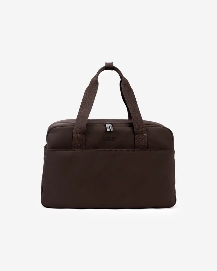 BASH* | Mini Weekender Mono in Terra (Category: Sling Bags) located in Quezon City. Submitted by avenue.de.belle (Listing ID 1454383022, Image 2). Description: BASH* | Mini Weekender Mono in Terra • Mini Weekender 🚨 Limited pieces available in limited quantities. Once sold, they’re gone. 🚨 • DESCRIPTION Everything you love about our Mini Weekender, now with hidden top access. Grab what you need without laying your bag flat, then get moving. Fin