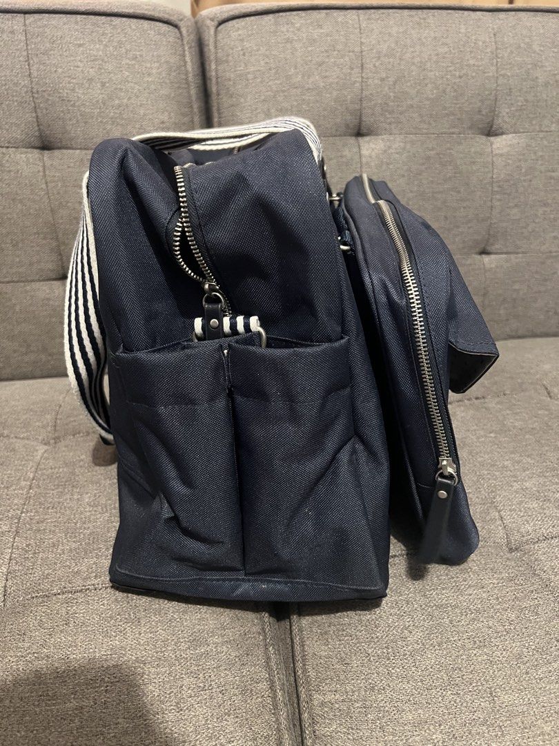 Beaba Diaper Travelling Bag (Category: Diaper Bags & Wetbags) located in Las Pinas. Submitted by r3shop2020 (Listing ID 1454393256, Image 2). Description: Beaba Geneve II Changing Bag • Color: Navy Blue (unisex ang color, bagay din kay daddy) • Barely used, dinadala lang during pedia visits. • Bought at ₱5,300 from the orange app - Beaba site last August 2025 • Complete set (insulated storage pouch, pacifier case, changing pad, shoulder strap and