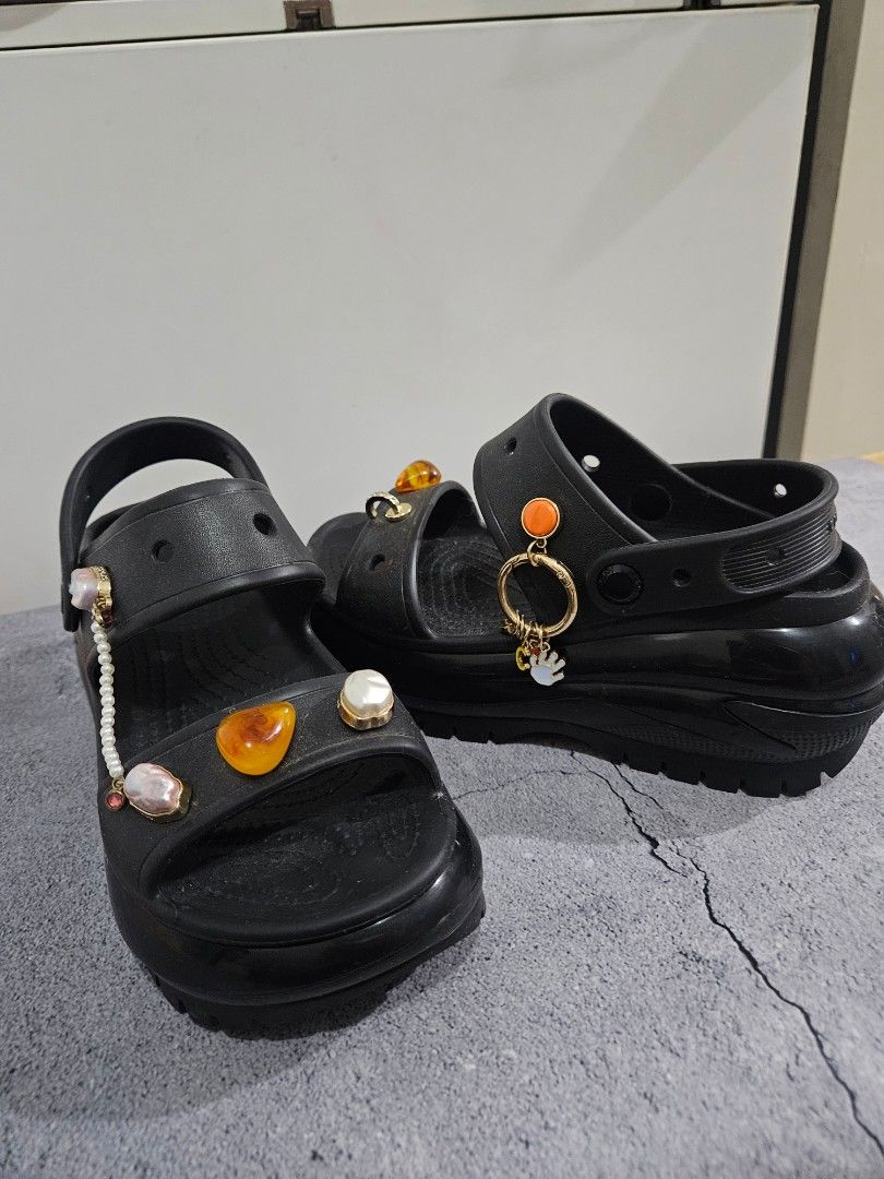 Black Crocs Platform Sandals with Charms Jibbitz (Category: Flats & Sandals) located in Caloocan City. Submitted by jane_maze (Listing ID 1454501654, Image 3). Description: Original Crocs Mega Crush sandals Customized with orig crocs jibbitz seldom used size W6 Platform sole for added height.